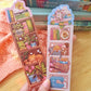 Fiber Arts Bookshelf Laminated Bookmark